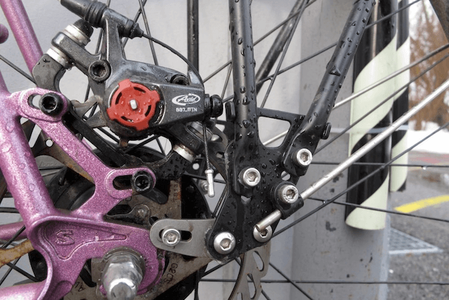 Disc brake with ugly rack mount